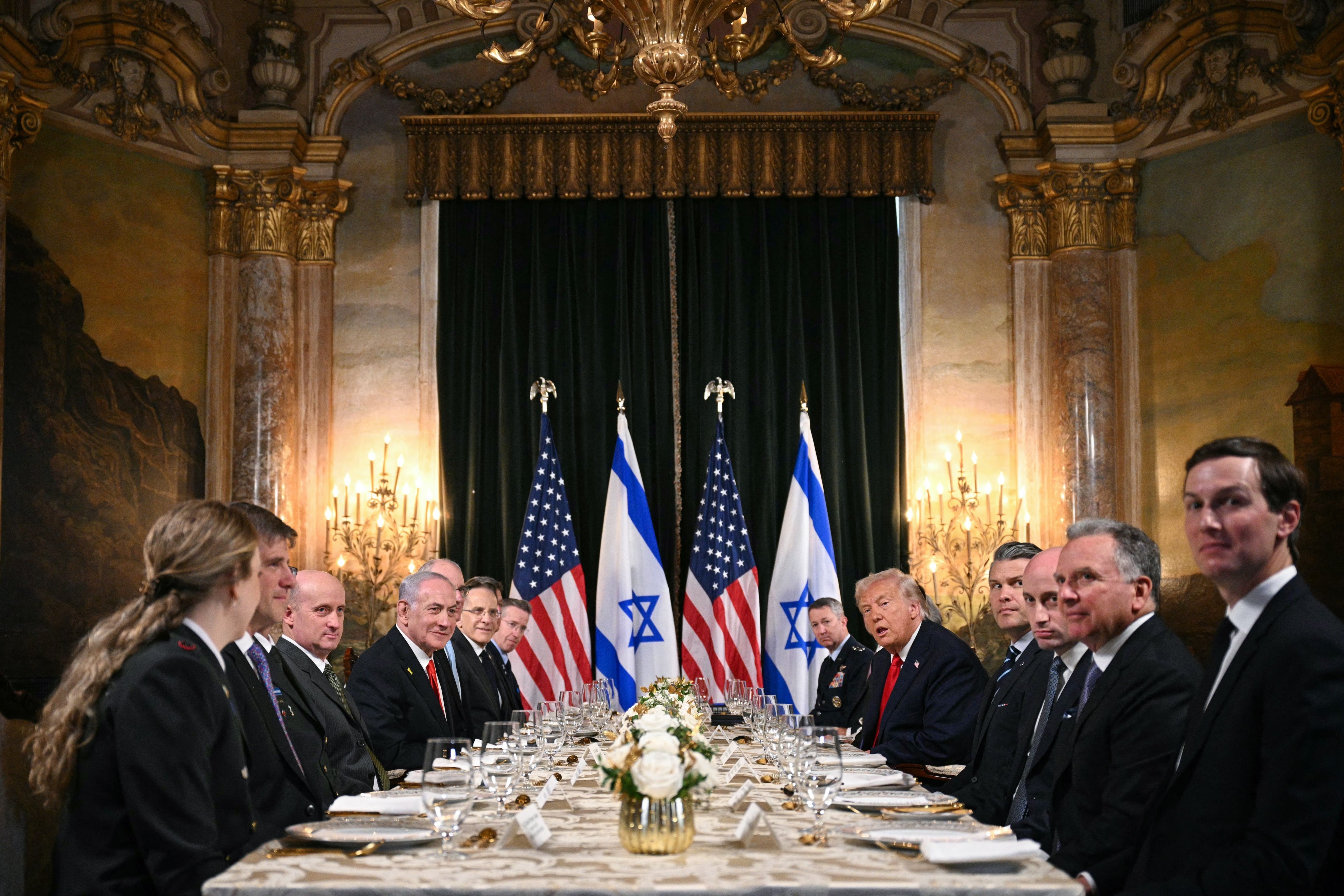 US President Donald Trump (center-right) meets with Israeli Prime Minister Benjamin Netanyahu (center-left) during a bilateral meeting at Trump's Mar-a-Lago residence in Palm Beach, Florida, on December 29, 2025.