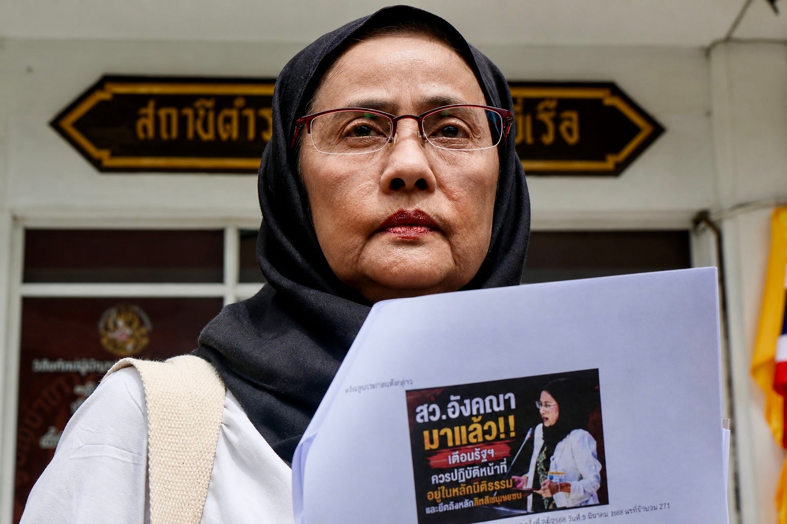Angkhana Neelapaijit reports online attacks against her at Bang Yi Reua police station in Bangkok, Thailand, July 31, 2026.