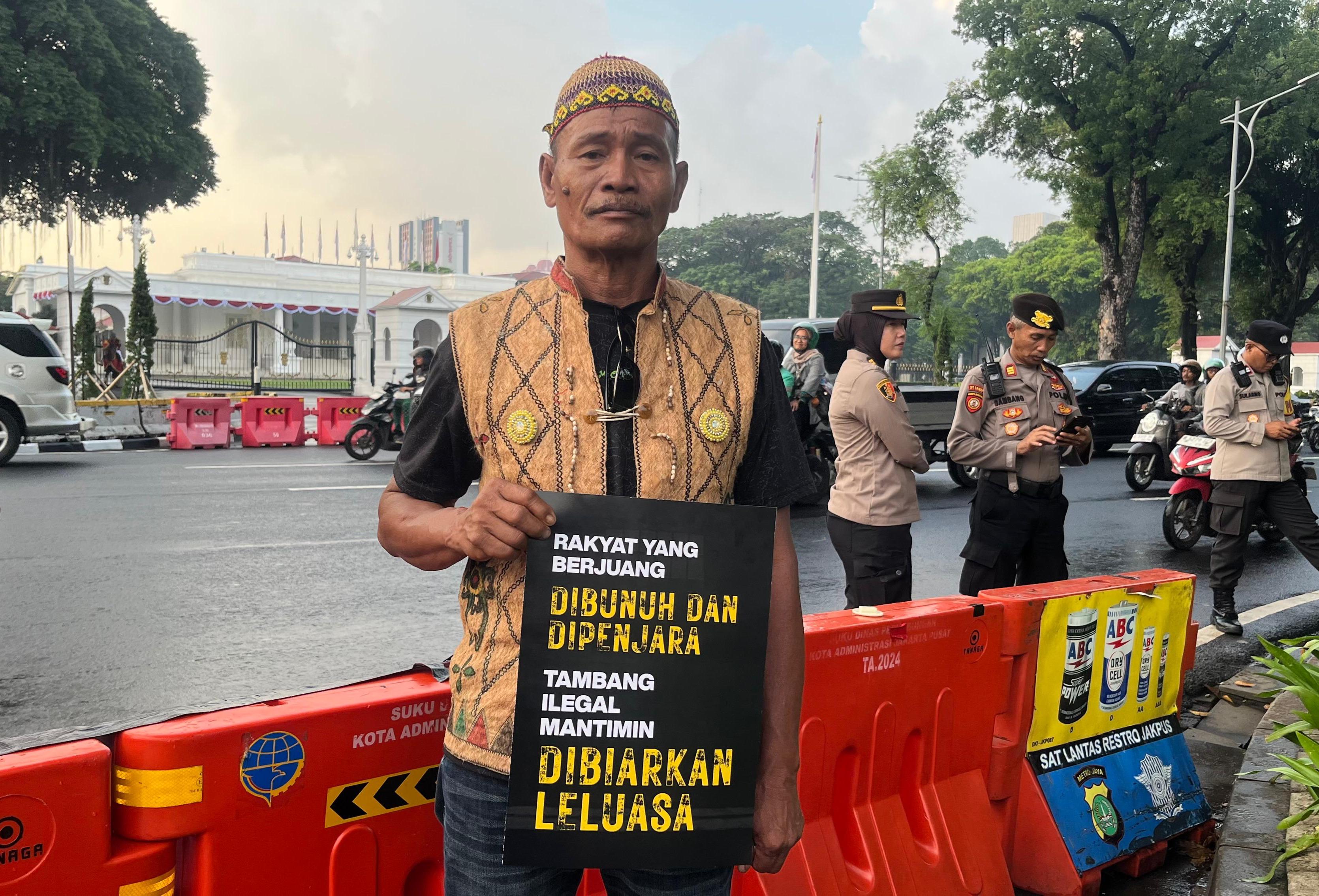 Misran Toni, an Indigenous Dayak farmer, protesting against coal mining outside the President Palace, Jakarta, on June 25, 2026.