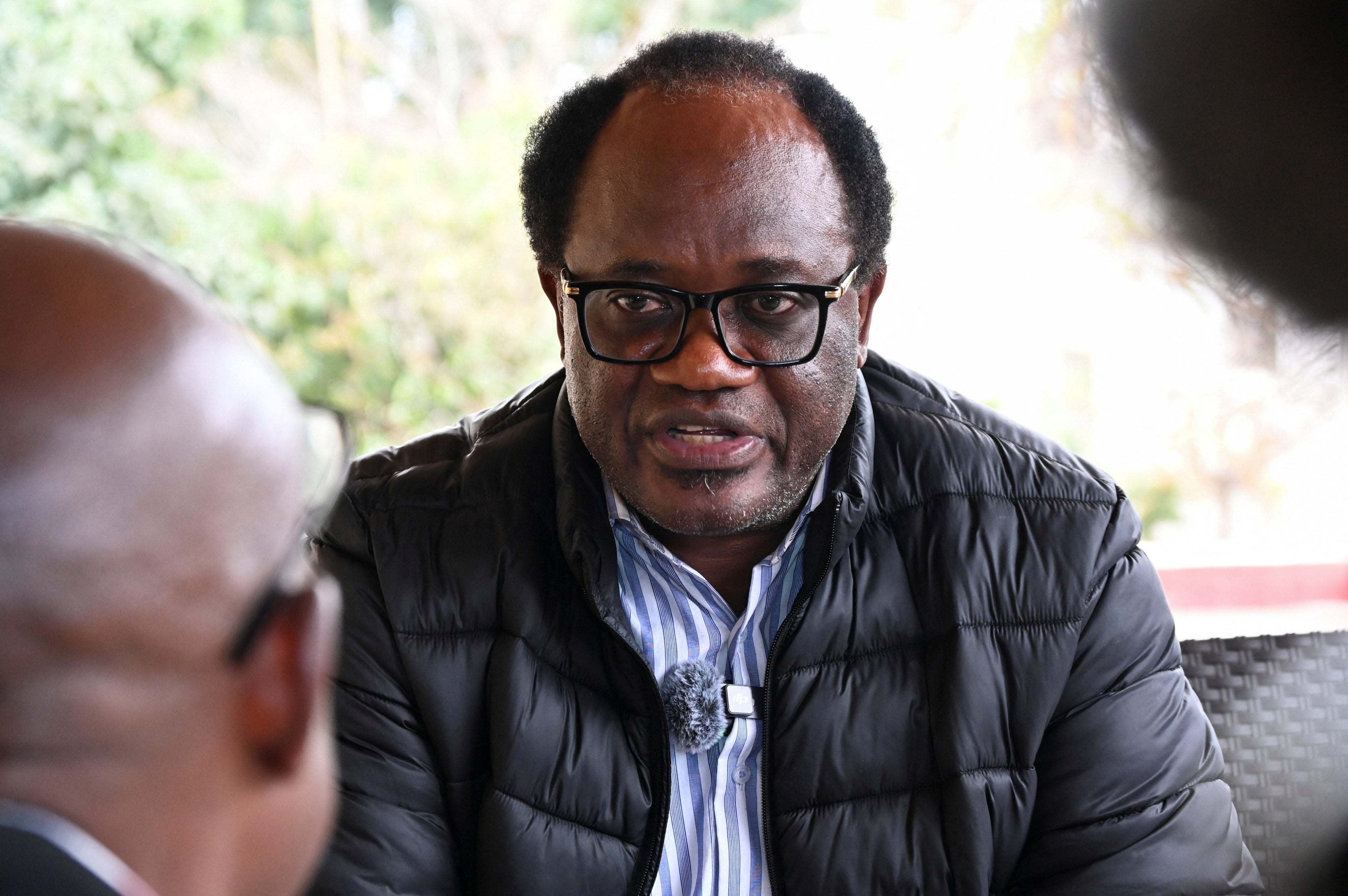 Zambian opposition leader and National Reconciliation Party for Unity and Prosperity (NRPUP) presidential candidate Brian Muntayalwa Mundubile speaks to members of the media after casting his vote in Lusaka, Zambia, August 13, 2026.