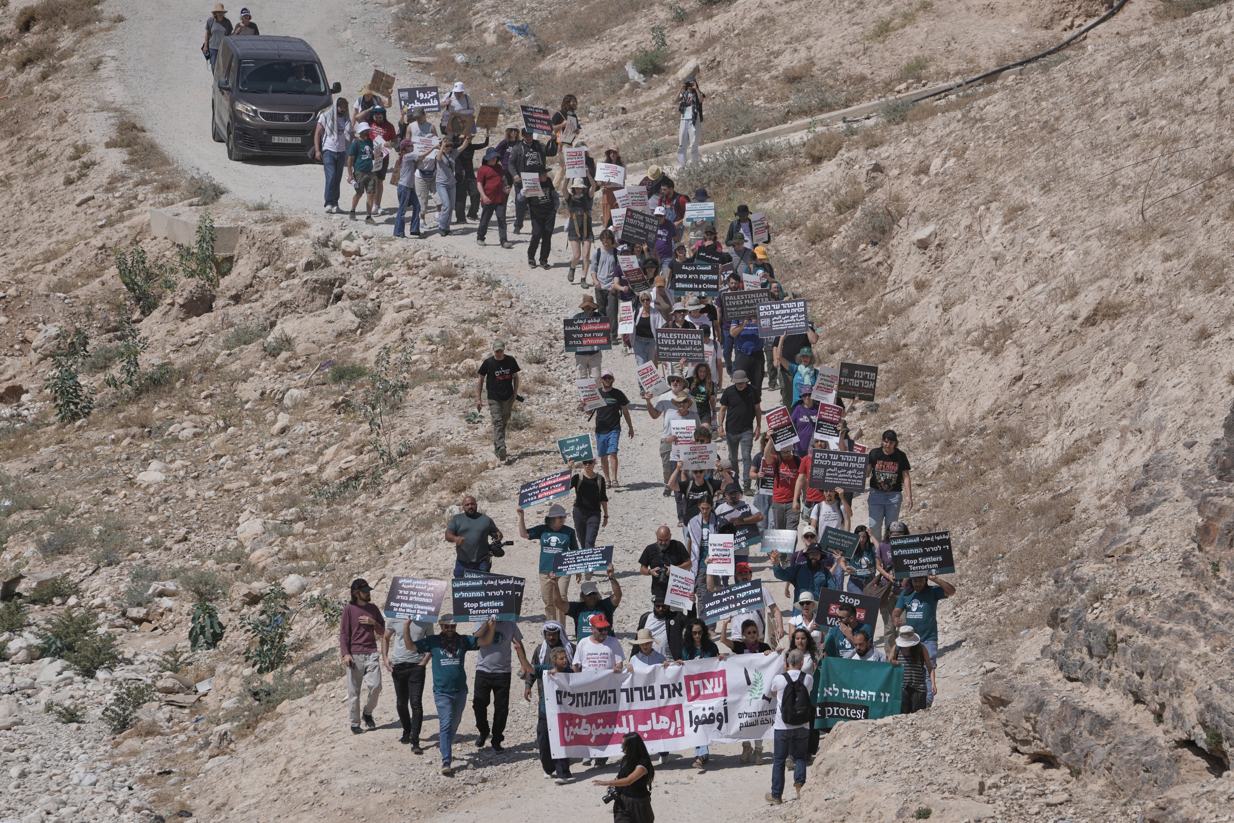 Activists rally in support of the Bedouin communities of Khan al-Ahmar in the occupied West Bank, June 12, 2026. 