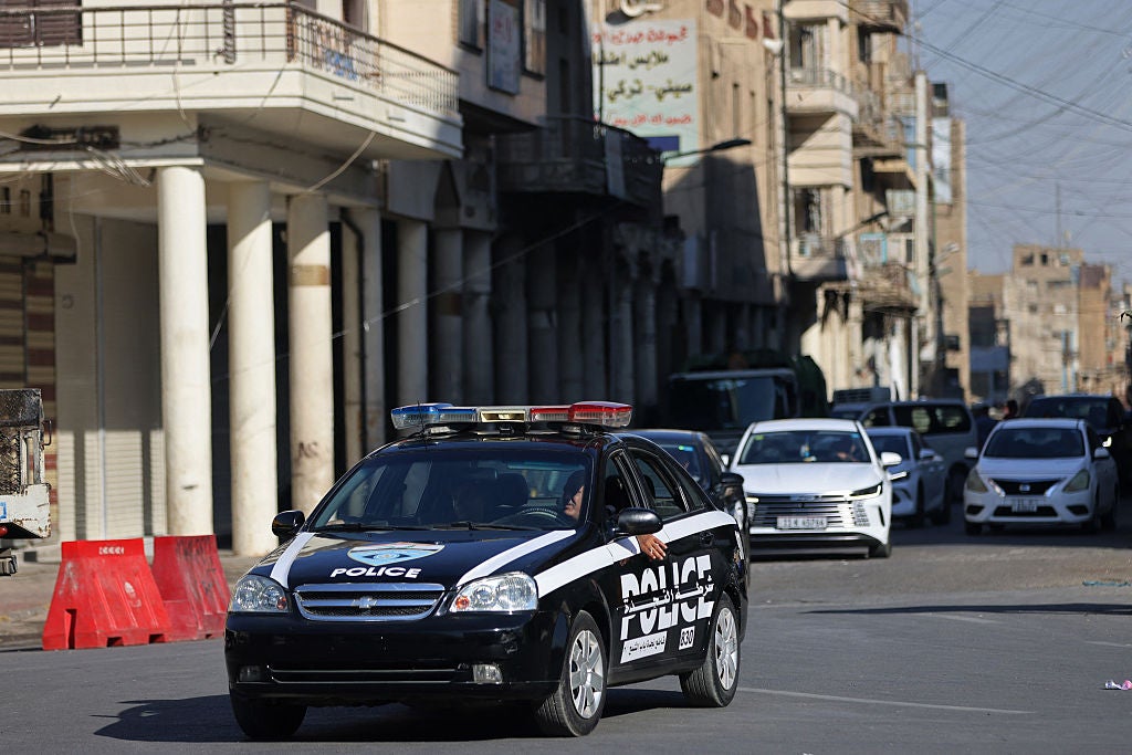 Iraqi police patrol a street in Baghdad, June 28, 2026.