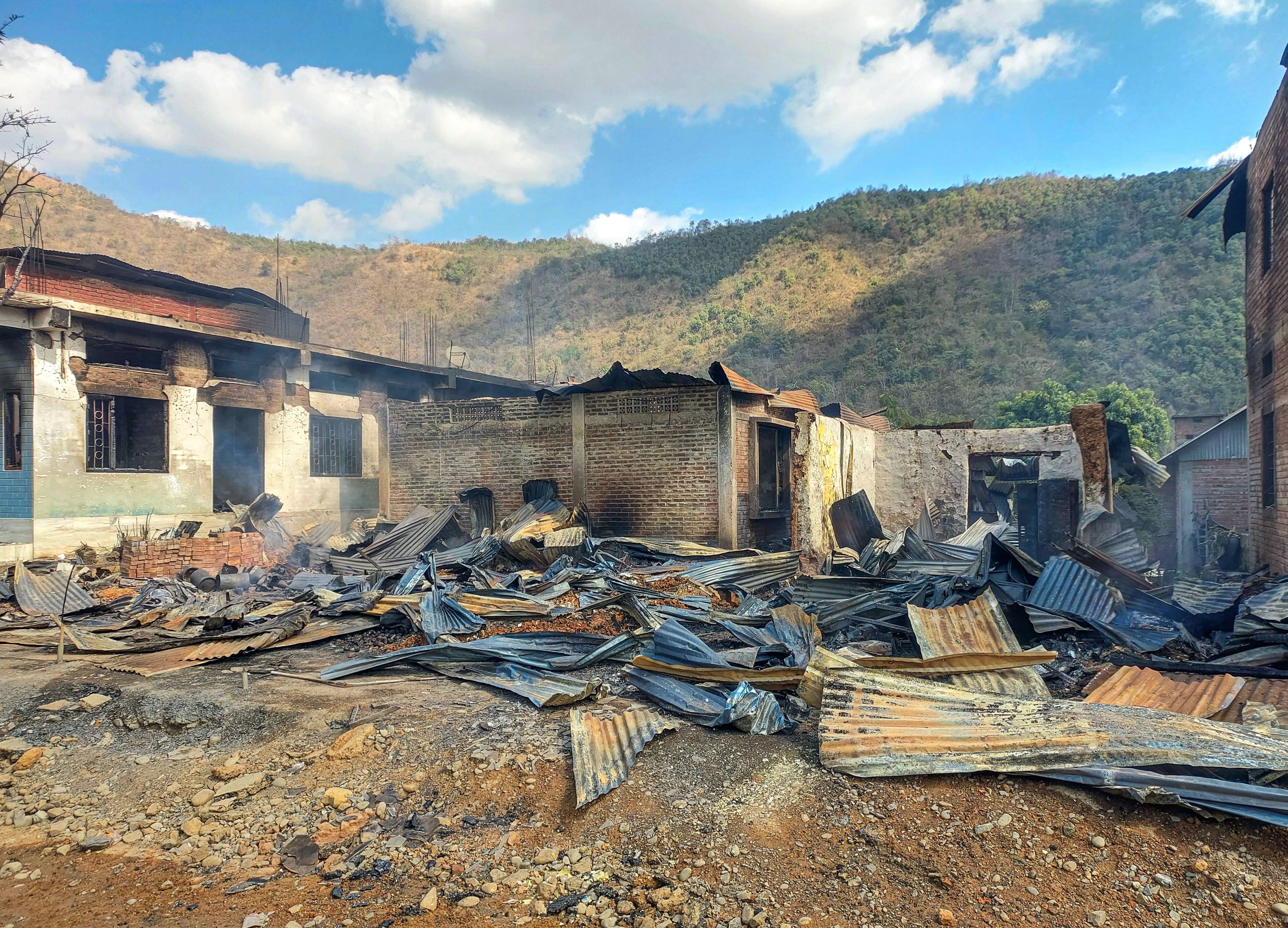 Charred remains of a building following a violent clash between the Tangkhul Naga and Kuki tribes at Litan village, in Ukhrul, Manipur, India, February 10, 2026. 