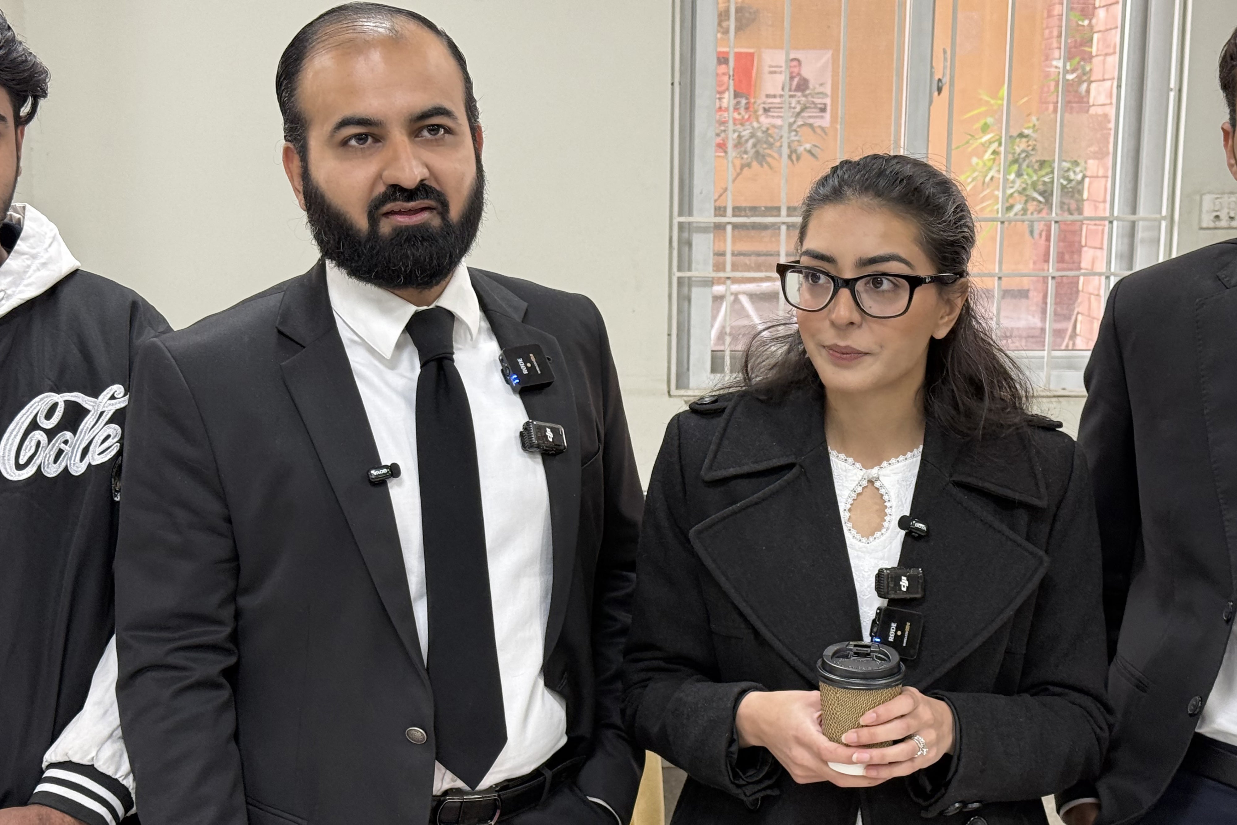 Human rights lawyers Imaan Mazari (right) and Hadi Ali Chattha, during a court hearing in Islamabad, Pakistan, December 5, 2025. 