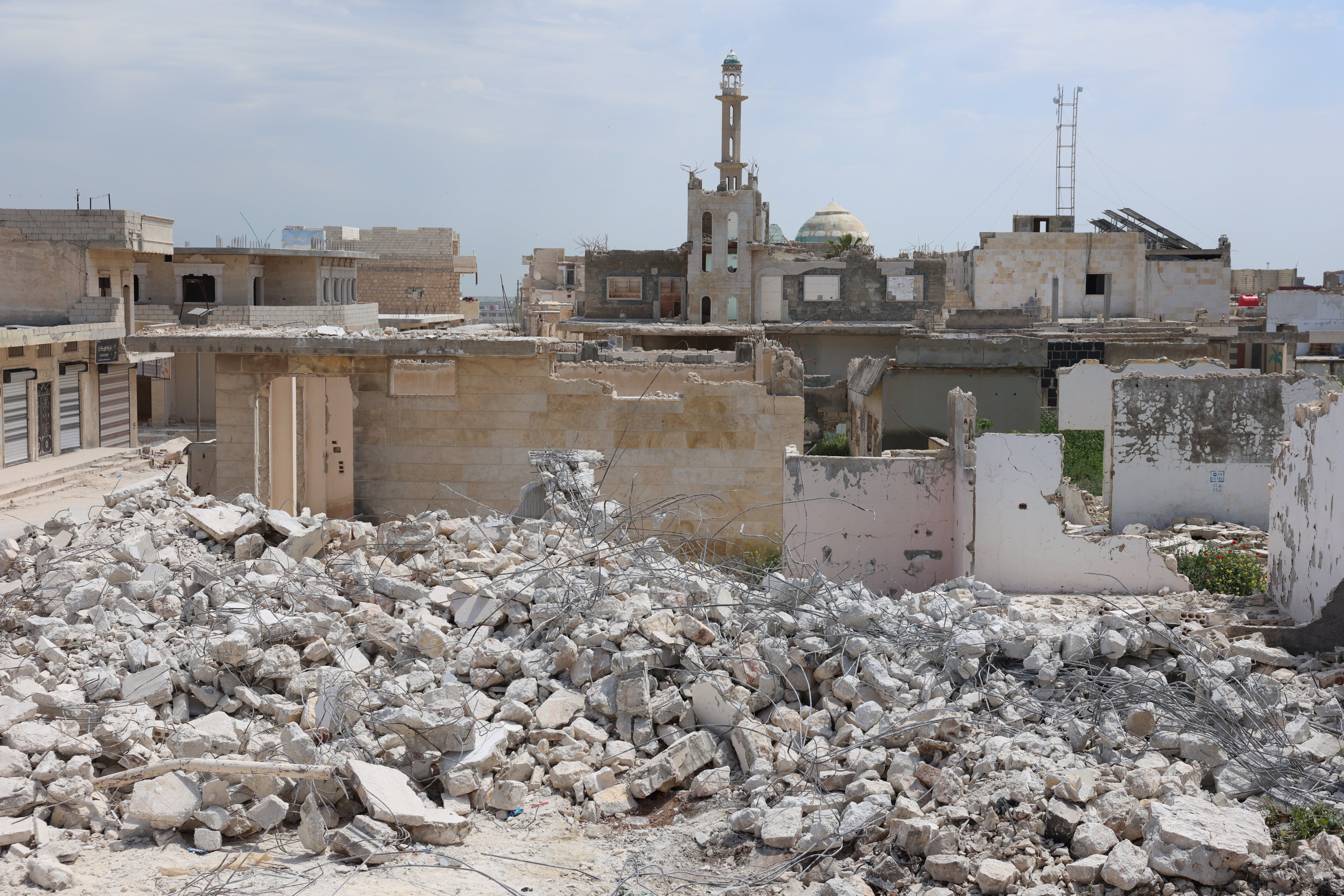 Rubble and damaged buildings in Ghadfa village, Idlib countryside, Syria, May 2026.