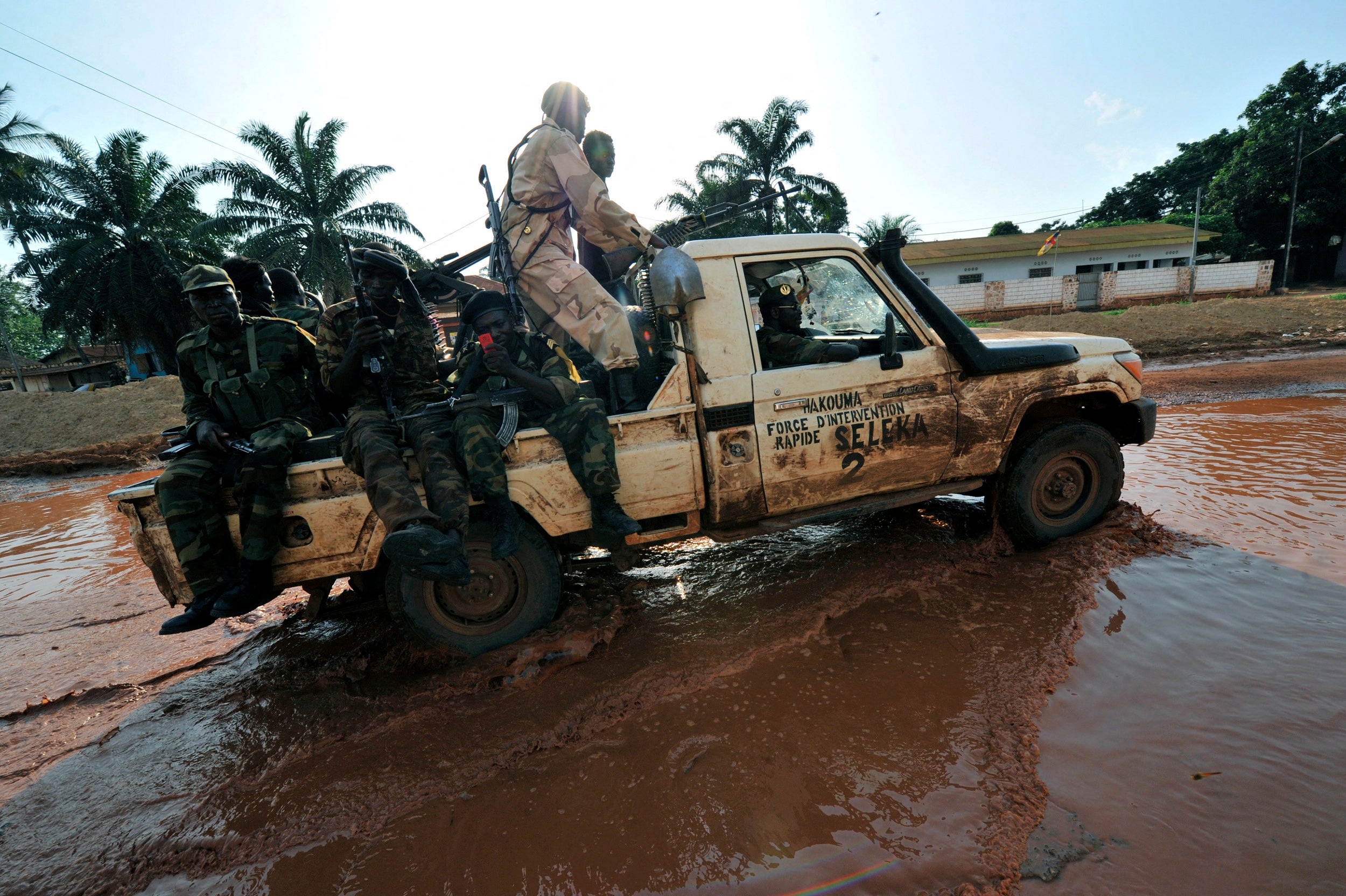 Seleka forces patrol a street of Bangui in a truck