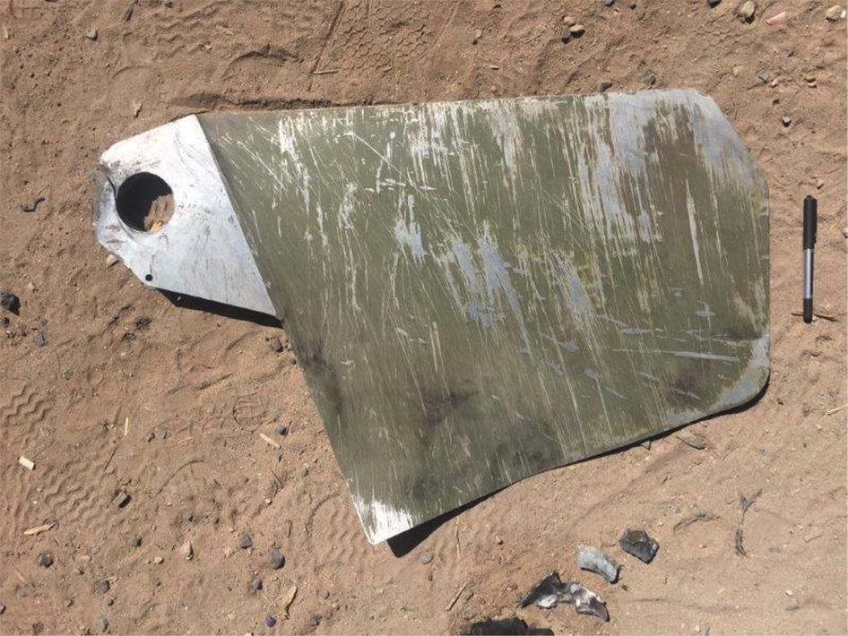 Remnants of a guidance fin assembly for the laser-guided Paveway III bomb, which is produced by the US company Raytheon, found at the site after an airstrike on the residential neighborhood of Thabwa in Sanaa, the capital, on October 26, 2015. 