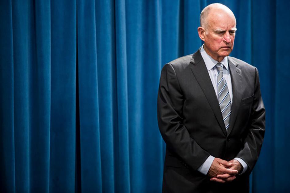 California Governor Jerry Brown waits to speak during a news conference at the State Capitol in Sacramento on March 19, 2015.
