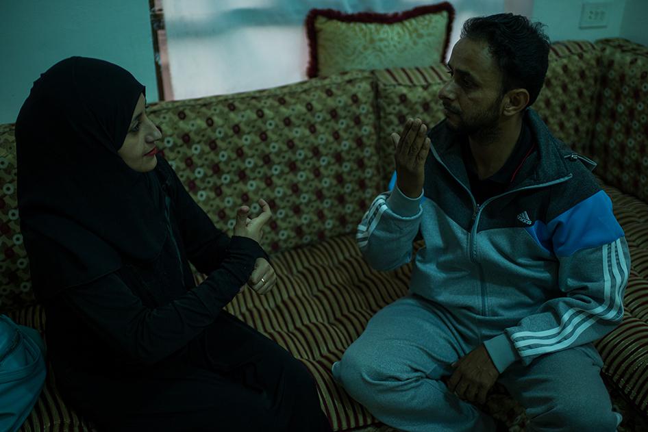 Muna, a 26-year-old deaf woman who lives in Sanaa, communicates in sign language with her husband, Adb, who is also deaf. She told Human Rights Watch about her how the conflict has impacted her.