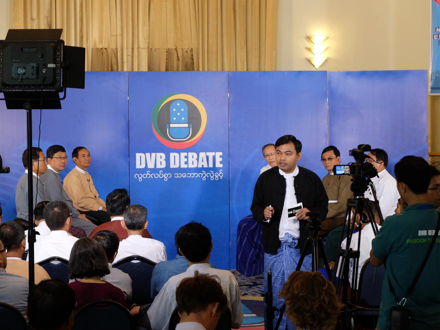 Candidates sit at Burma’s first nationally televised political debate in Rangoon on November 4, 2015.