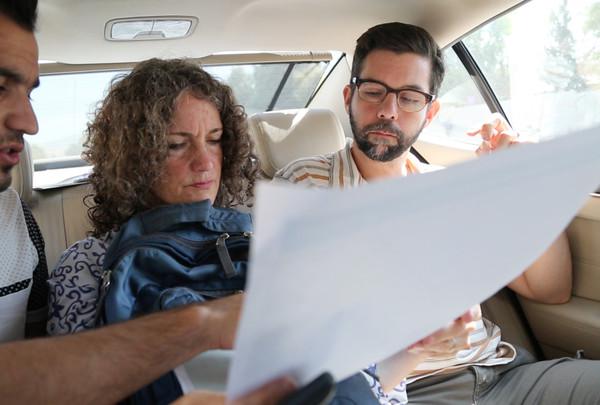 Letta Tayler (center) and Fred Abrahams (right), analyze ways to reach and interview displaced Yeizidis fleeing from the extremist group Islamic State (also known as ISIS) in Iraq on September 5, 2014.
