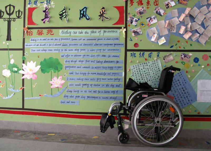 A wheelchair stands outside a classroom in the Beichuan Middle School in China's Sichuan province May 10, 2011.