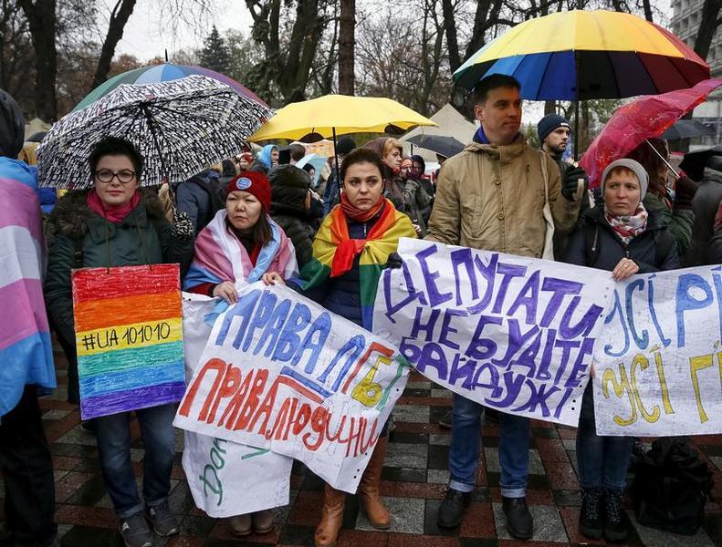 Gay rights activists attend a rally outside the parliament building in Kiev, Ukraine, November 10, 2015.