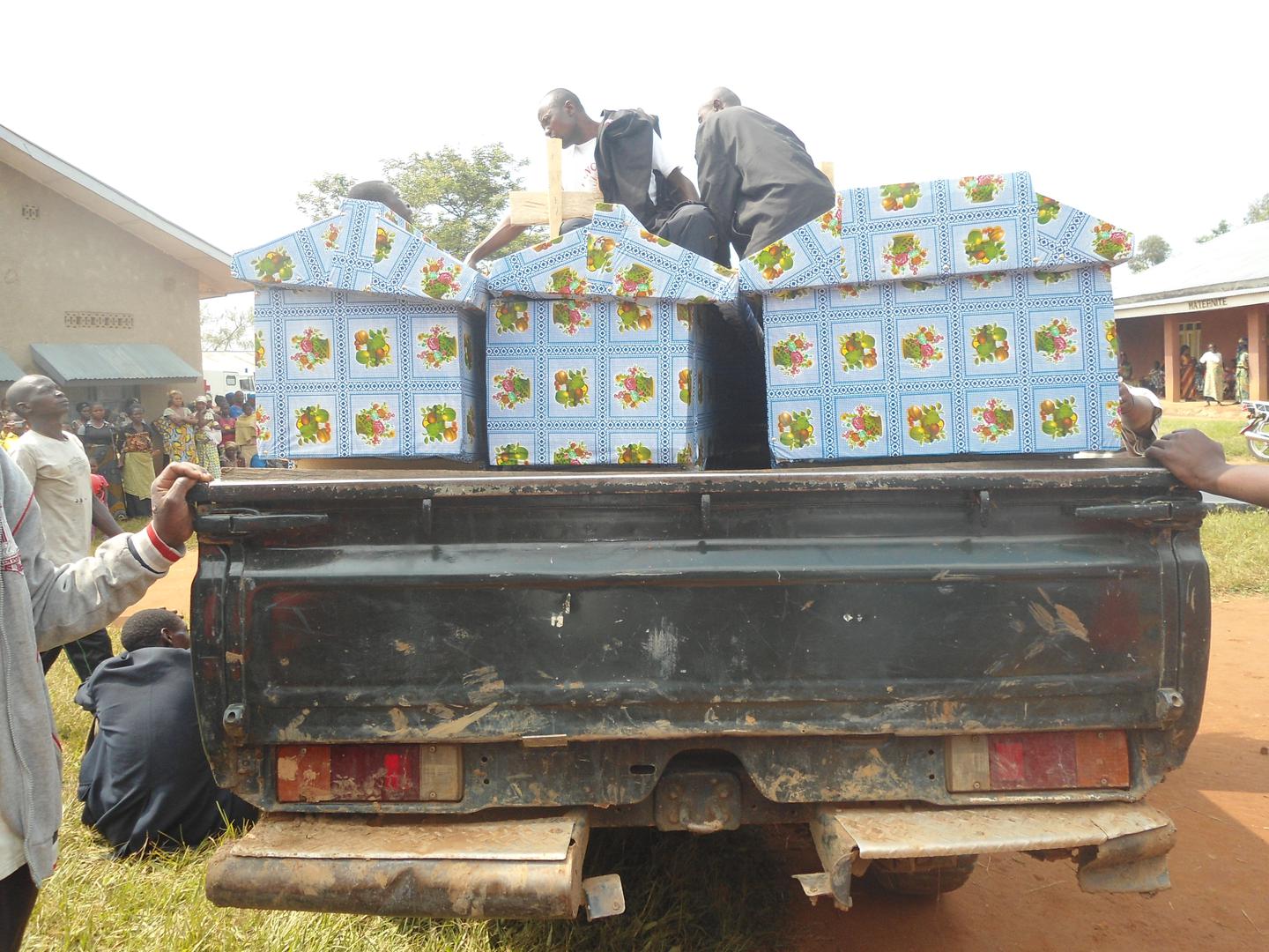 Coffins of three people killed on December 1, 2014 in Eringeti, around 60 kilometers north of Beni town. A total of six people were killed that day. The most recent attack documented by Human Rights Watch in Eringeti was on May 3, 2016, killing 19.