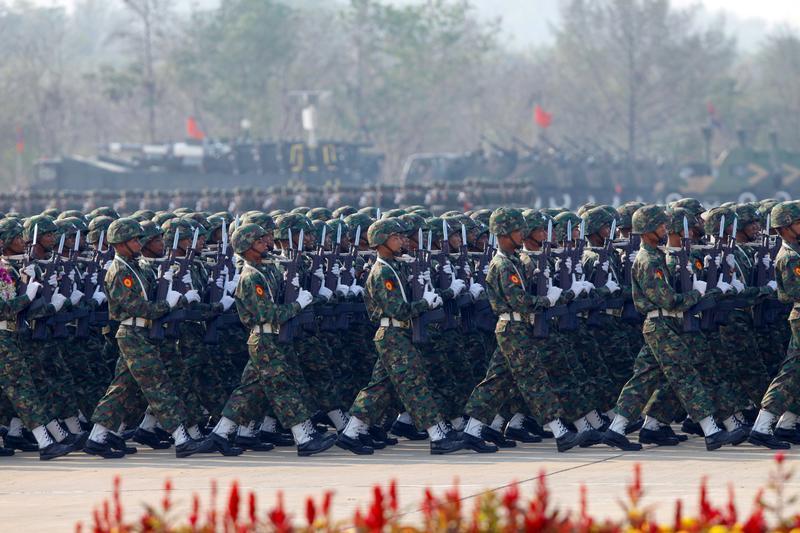 Soldiers parade to mark the 70th anniversary of Armed Forces Day in Burma's capital Naypyidaw, March 27, 2015.