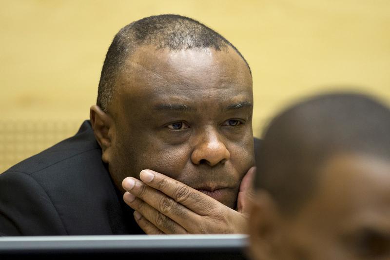 Former Congo vice-president Jean-Pierre Bemba looks up when sitting in the courtroom of the International Criminal Court to stand trial in The Hague, Netherlands, September 29, 2015.