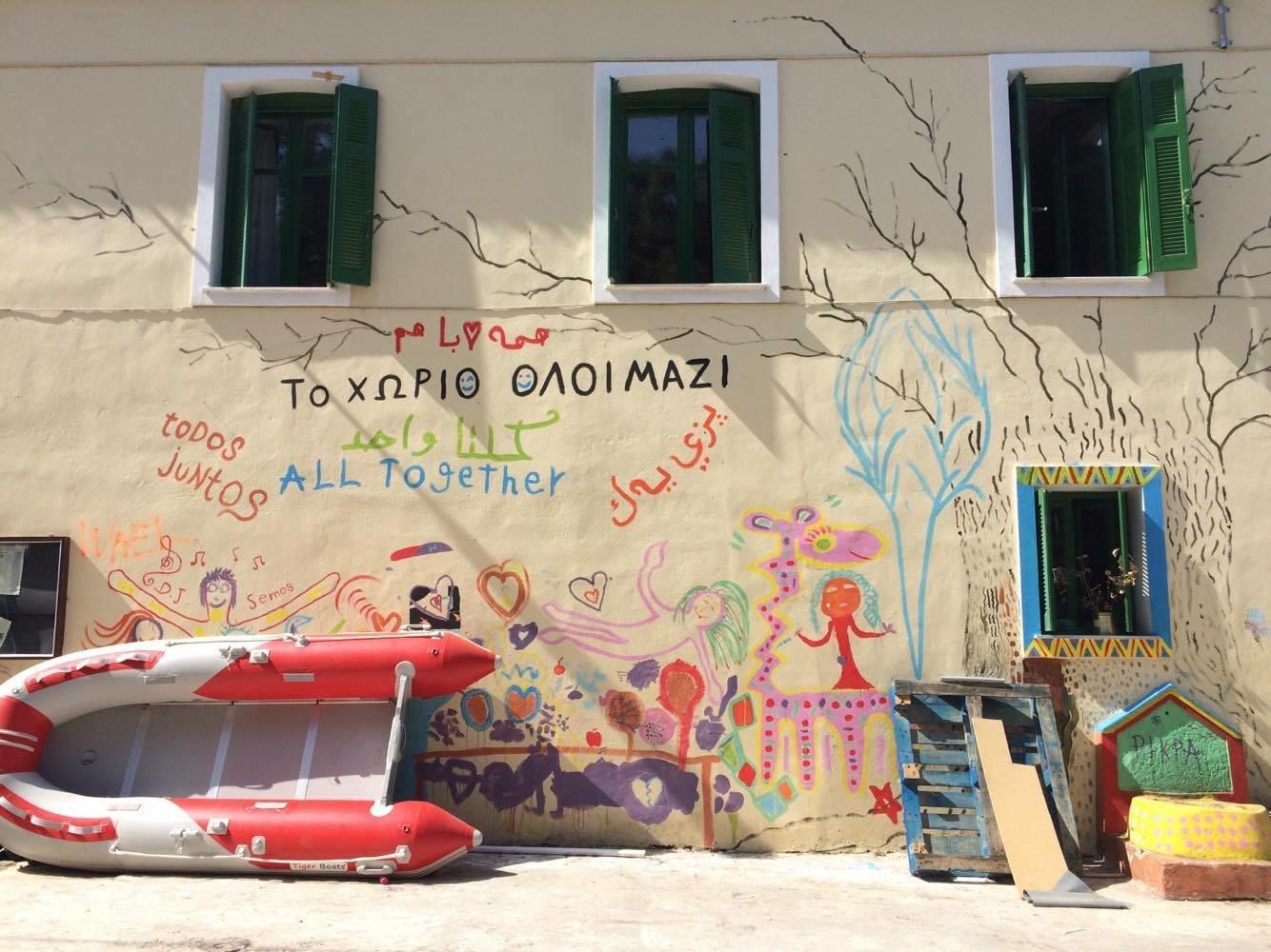 Mural painting welcoming asylum seekers and migrants at PIKPA, a volunteer-run camp on Lesbos island, Greece. Since 2012 thousands of people fleeing war and persecution who have reached the island have found shelter at PIKPA.