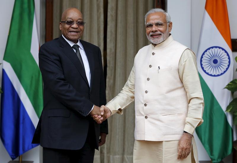 South Africa's President Jacob Zuma (L) shakes hands with India's Prime Minister Narendra Modi during a photo opportunity before the start of their bilateral meeting at Hyderabad House in New Delhi, India, October 28, 2015.