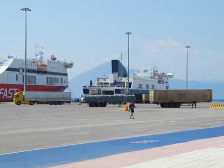 Trucks of the sort unaccompanied migrant children stow away on hoping to reach Italy, ready to be loaded onto ships at the Patras port. Children stow away between the axles, inside fuel tanks, or inside refrigerated containers.