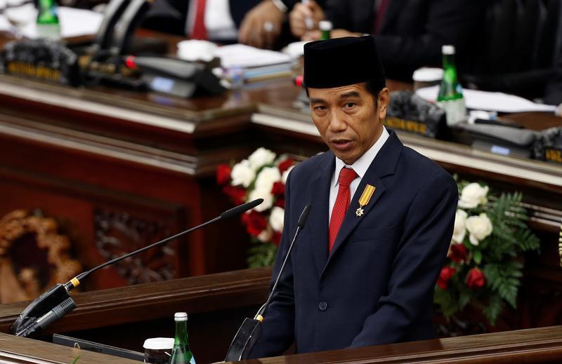 Indonesia's President Joko “Jokowi” Widodo delivers a speech in front of parliament members at the House of Representative building in Jakarta, Indonesia, August 16, 2016.