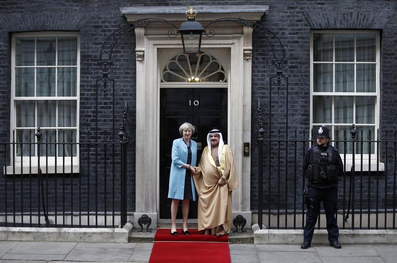 Britain's Prime Minister Theresa May (L) greets Bahrain's King Hamad bin Isa al-Khalifa in front of 10 Downing Street, in London, Britain October 26, 2016.