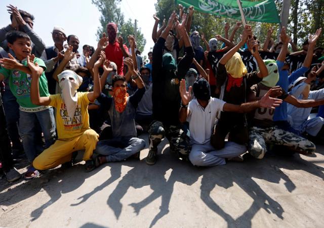 Demonstrators shout slogans during a protest in Srinagar against the recent killings in Kashmir on September 7, 2016. 