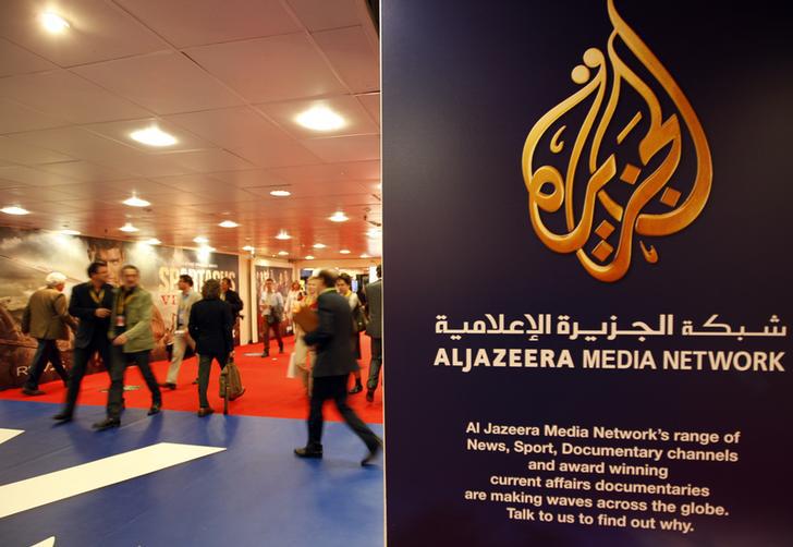 The logo of Al Jazeera Media Network is seen at the International Television Programs Market event in Cannes on April 2, 2012. 