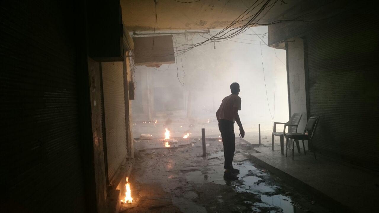 Fires after an incendiary attack in al-Sha’ar neighbourhood on September 30, 2016. 