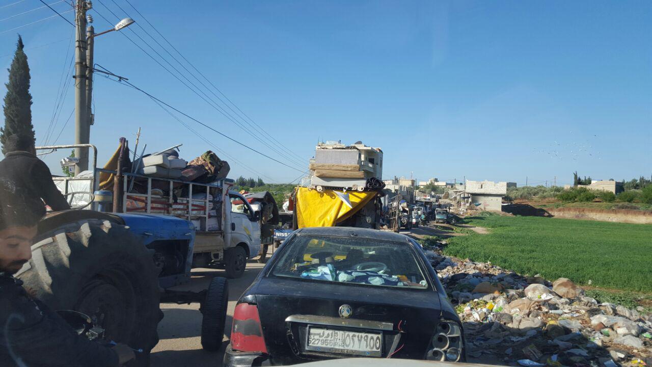 Internally displaced Syrians outside Azaz town, fleeing ISIS advances north of Aleppo near the closed Turkish border. 