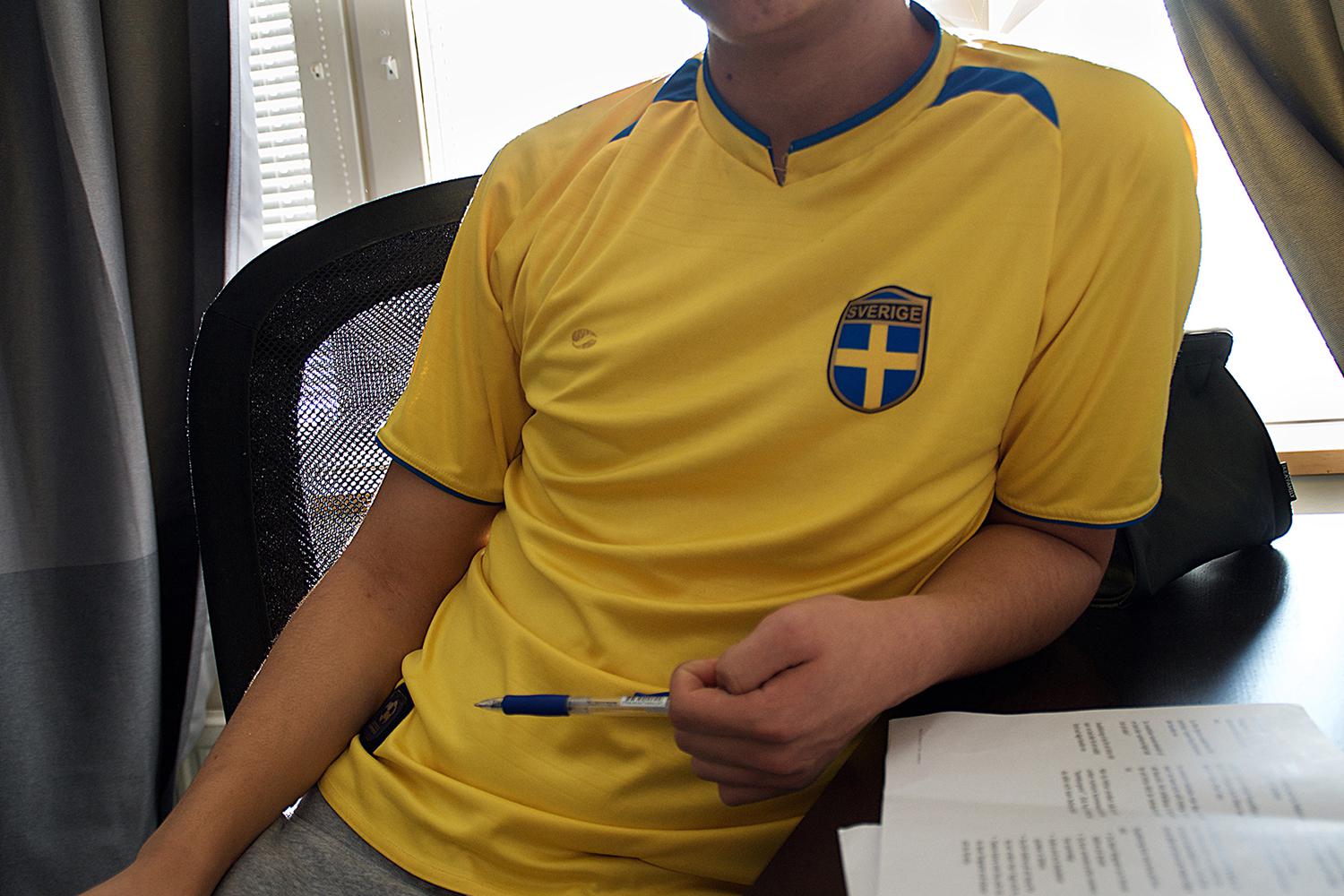 Wafa S., a 15-year-old boy from Afghanistan, doing his homework at a group home in Gothenburg, Sweden. He wants to continue his education but he told Human Rights Watch the long asylum process sometimes discourages him as he doesn't know what his future h