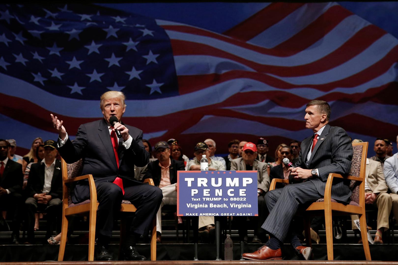 Donald Trump speaks alongside retired Lt. Gen. Mike Flynn during a campaign town hall meeting in Virginia, US, on September 6, 2016.