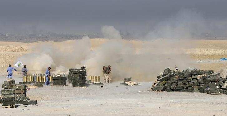 Popular Mobilization Force members on the frontline with the Islamic State in al-Fatha, northeast of Baiji, Iraq on October 18, 2015.