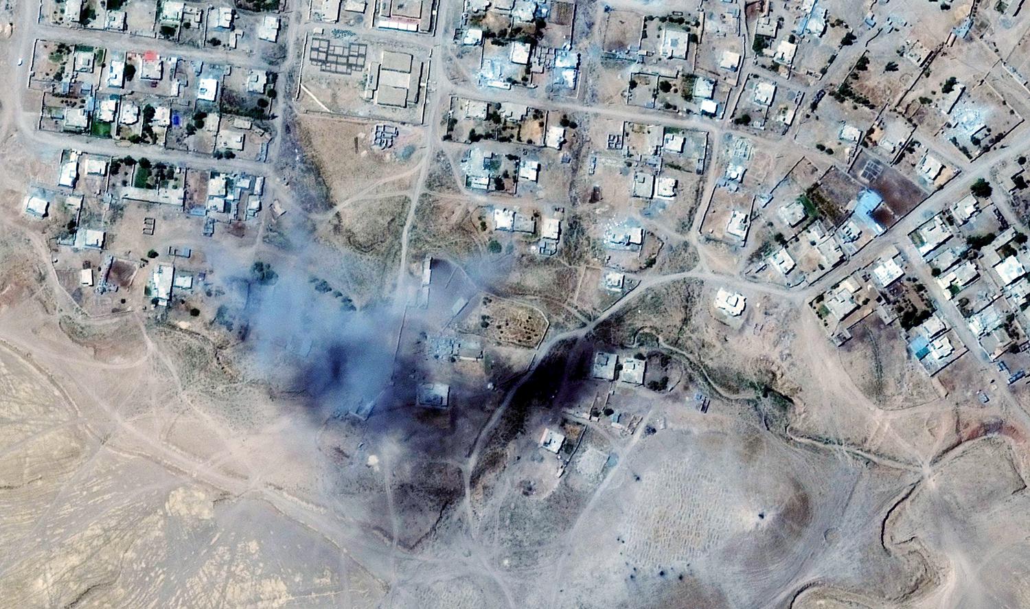 Smoke plume from building demolition on September 7, 2014. Barzan, Nineveh Governorate.