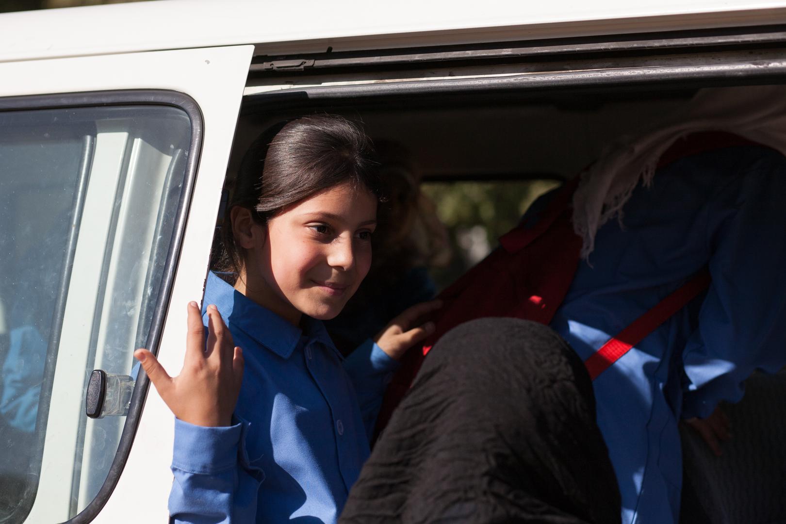 Bara’a boards her school bus after two years without a formal education.
