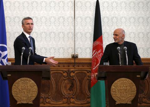 NATO Secretary General Jens Stoltenberg and Afghanistan's President Ashraf Ghani speak at a news conference in Kabul on March 15, 2016.
