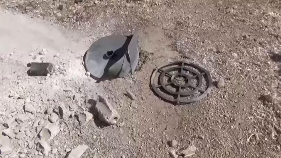 A photo of a ZAB 2.5 incendiary submunition and remnants of a RBK-500 bomb in Khan Shaykun south of Idlib, following a September 30, 2016 attack. 