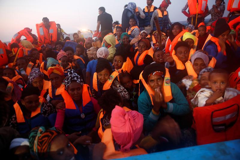 Migrants from Eritrea on an overcrowded wooden vessel during a rescue operation off the Libyan, August 29, 2016. 
