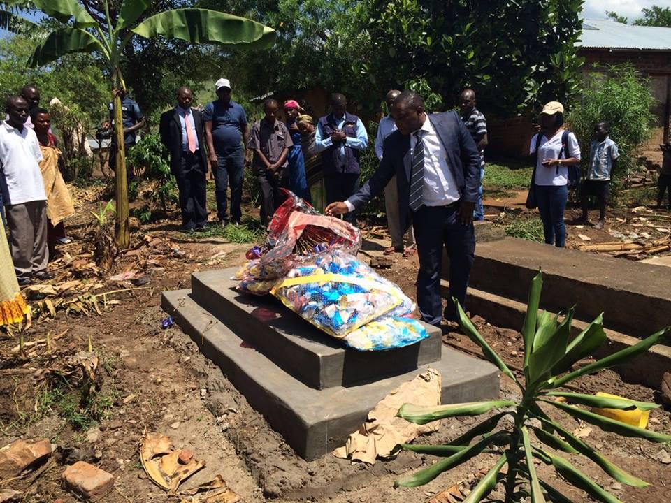 Mourners attend the funeral of Emmanuel Arituha, a security guard killed by assailants in an attack on the Ugandan non-governmental organization Human Rights Awareness and Promotion Forum (HRAPF) in May 2016.