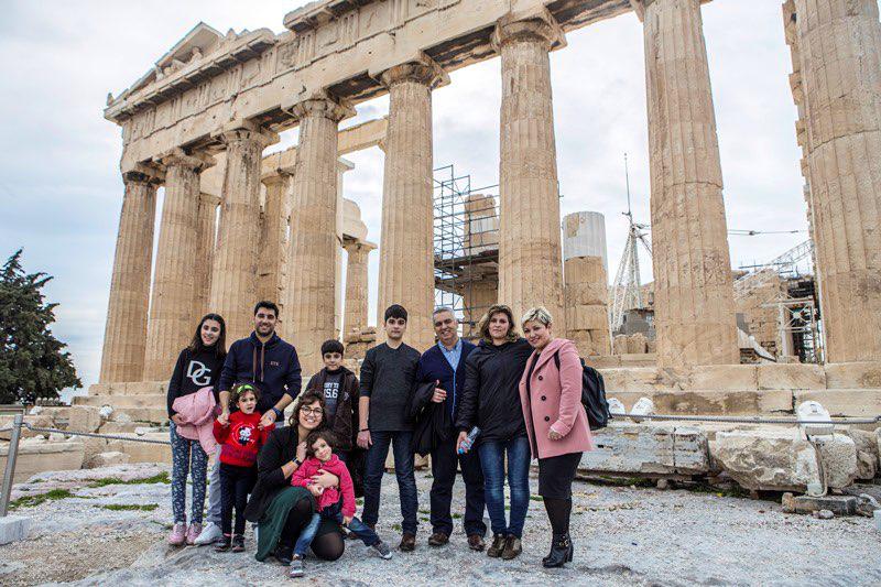 The Osanas and Falak’s family visit the Acropolis on their last day together in Athens. © 2017 Anna Pantelia