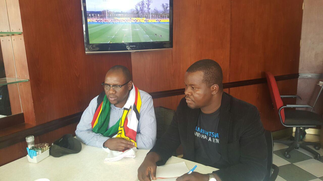 Pastor Evan Mawarire of the #ThisFlag campaign (Left) meets with Human Rights Watch Senior researcher Dewa Mavhinga in Johannesburg, South Africa, August 2016.