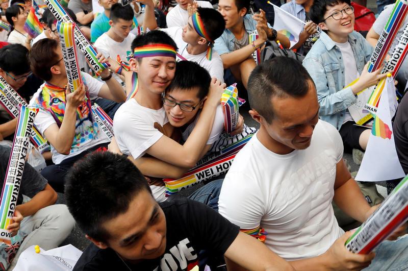 Supporters hug each other during a rally after Taiwan's constitutional court ruled that same-sex couples have the right to legally marry, the first such ruling in Asia, in Taipei, Taiwan May 24, 2017.