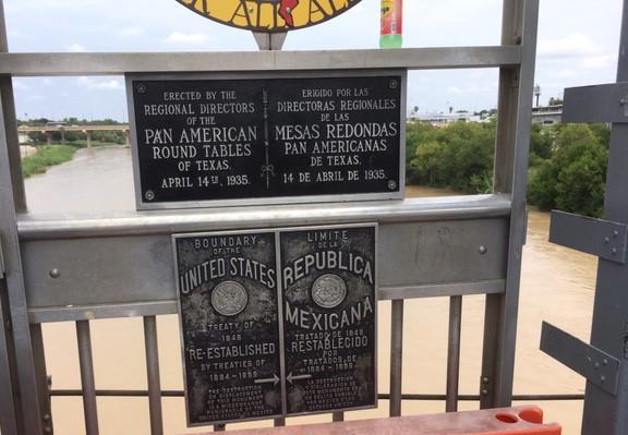 A plaque on the bridge between Laredo, Texas, and Nuevo Laredo, Mexico, demarcating the border crossing.
