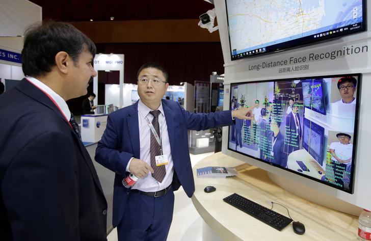 A booth displays face recognition software at an exhibition in Beijing, China, September 27, 2017.