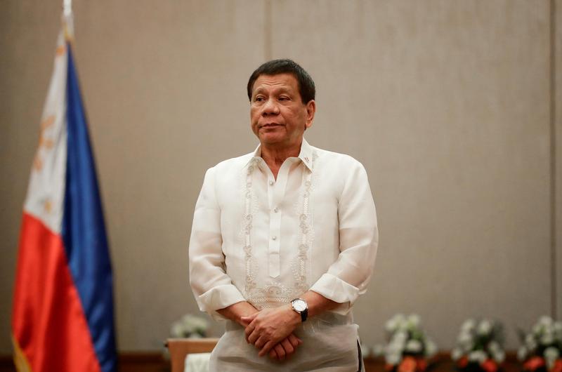 Philippine President Rodrigo Duterte stands during a call with the Association of Southeast Asian Nations (ASEAN) economic ministers in Manila, Philippines, September 6, 2017.
