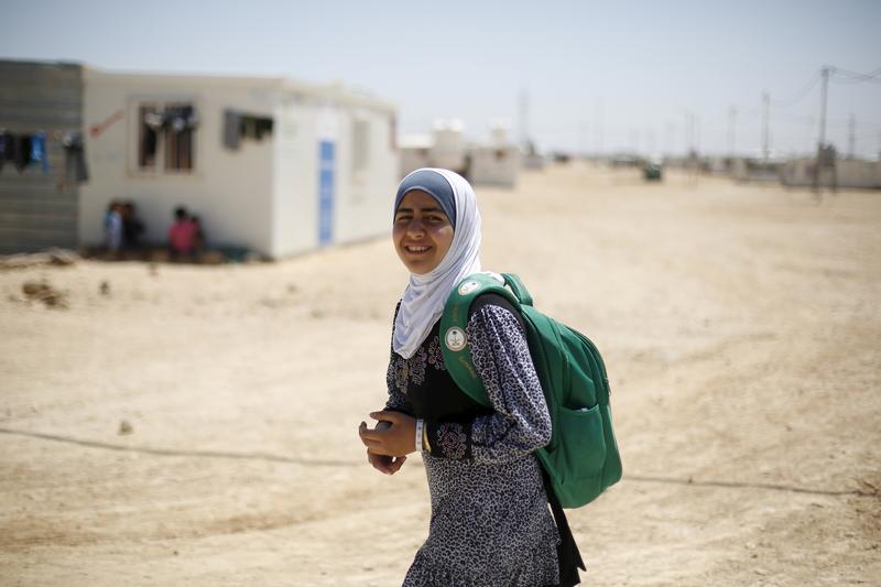 syrian girl with backpack