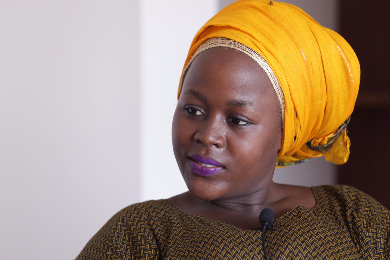 Cecilia, 22, said in Oman she worked 16 hours a day with no rest and no day off, and was paid 60 OMR instead of the 100 OMR her agent promised. She said her employer made sexual advances towards her and hit her after she refused. Dar es Salaam, Tanzania.