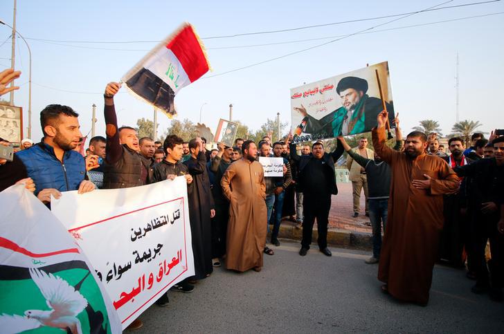 Protesters in Iraq stage a demonstration against the execution of three men in Bahrain, January 19, 2017. 