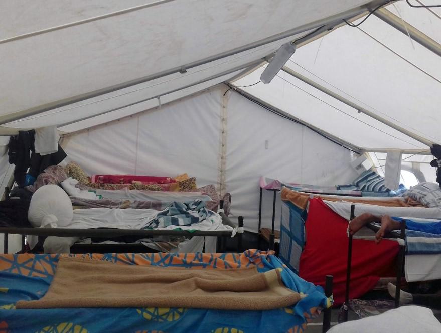 Inside of tent housing 24 men at Ceuta migrants center, March 2017.