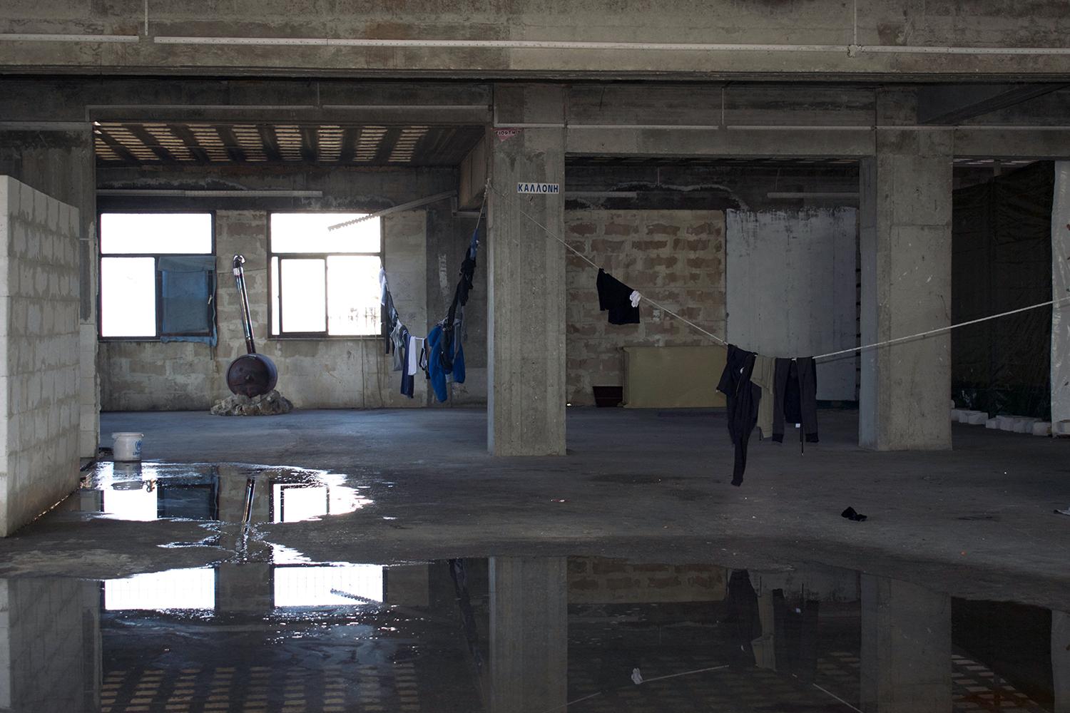 A refugee squat in an abandoned factory on Lesbos, Greece, where dozens of asylum seekers are living in fear of being forcibly returned to Turkey under the EU-Turkey deal. 