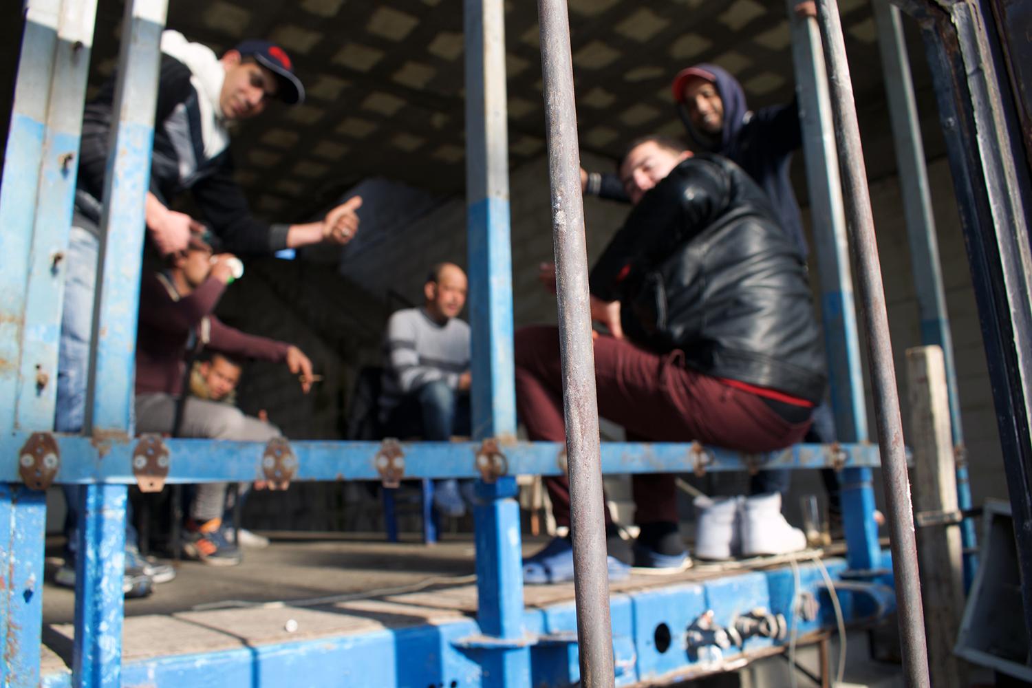 Asylum seekers from Algeria at a refugee squat on Lesbos. People of certain nationalities presumptively considered “economic migrants,” such as Algerians, are treated as having manifestly unfounded claims, and are often detained on that basis. 